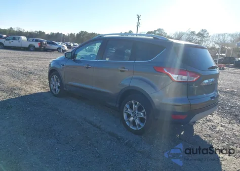 2014 Ford Escape Titanium z USA, uszkodzony, nr VIN 1FMCU0JX3EUB34011